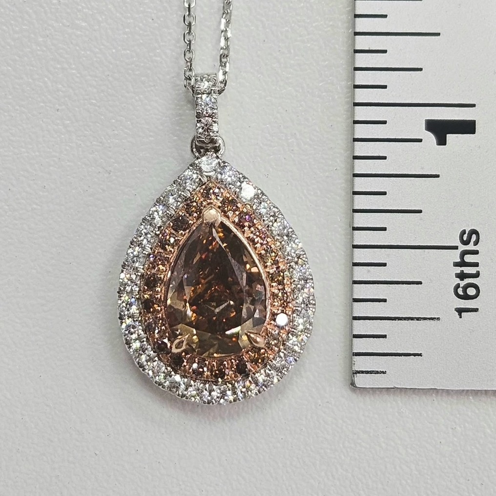 Ember Glow Diamond Pendant beside a ruler for scale